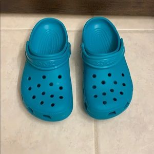 Teal crocs